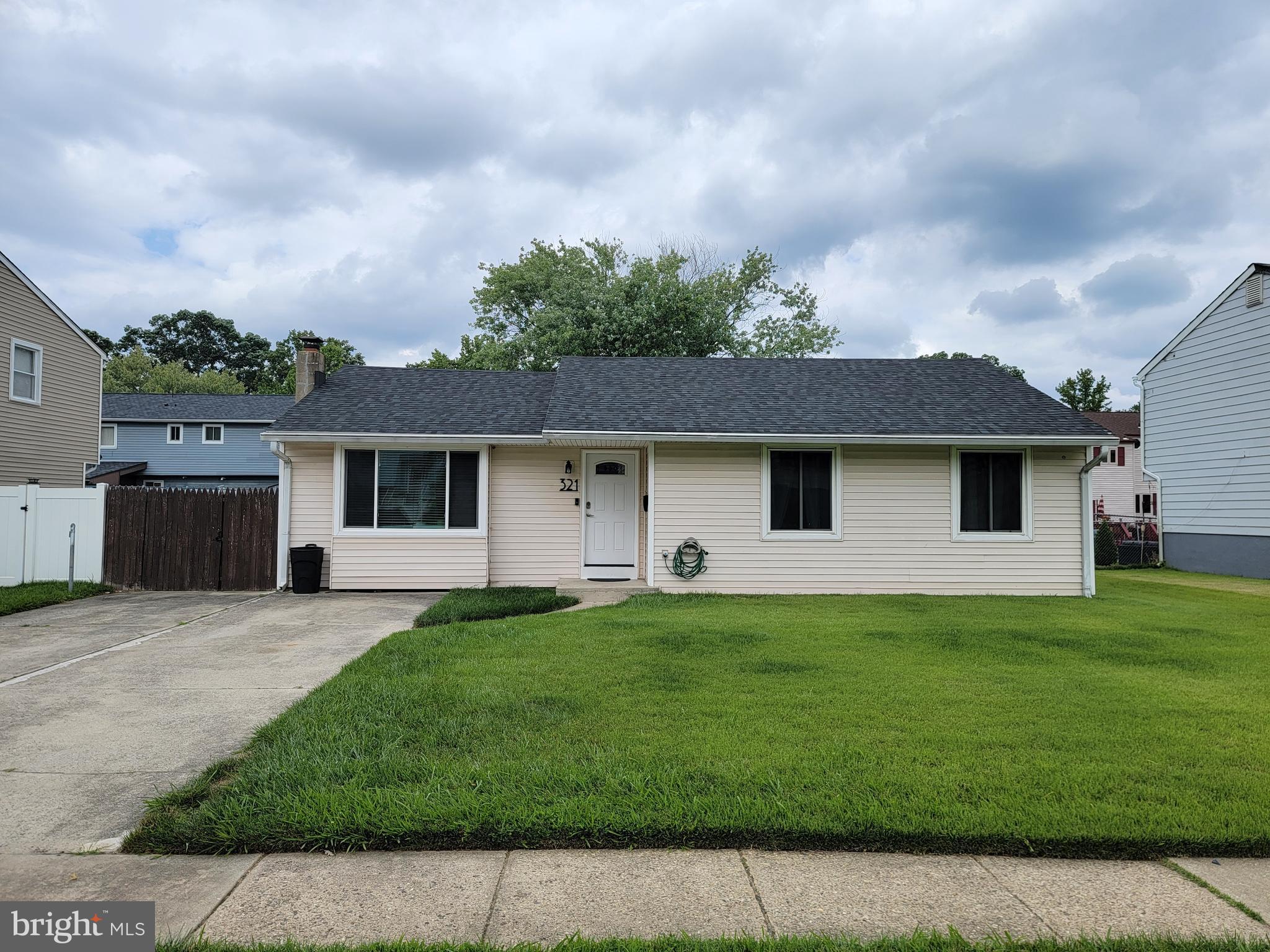 Front exterior of house and driveway.