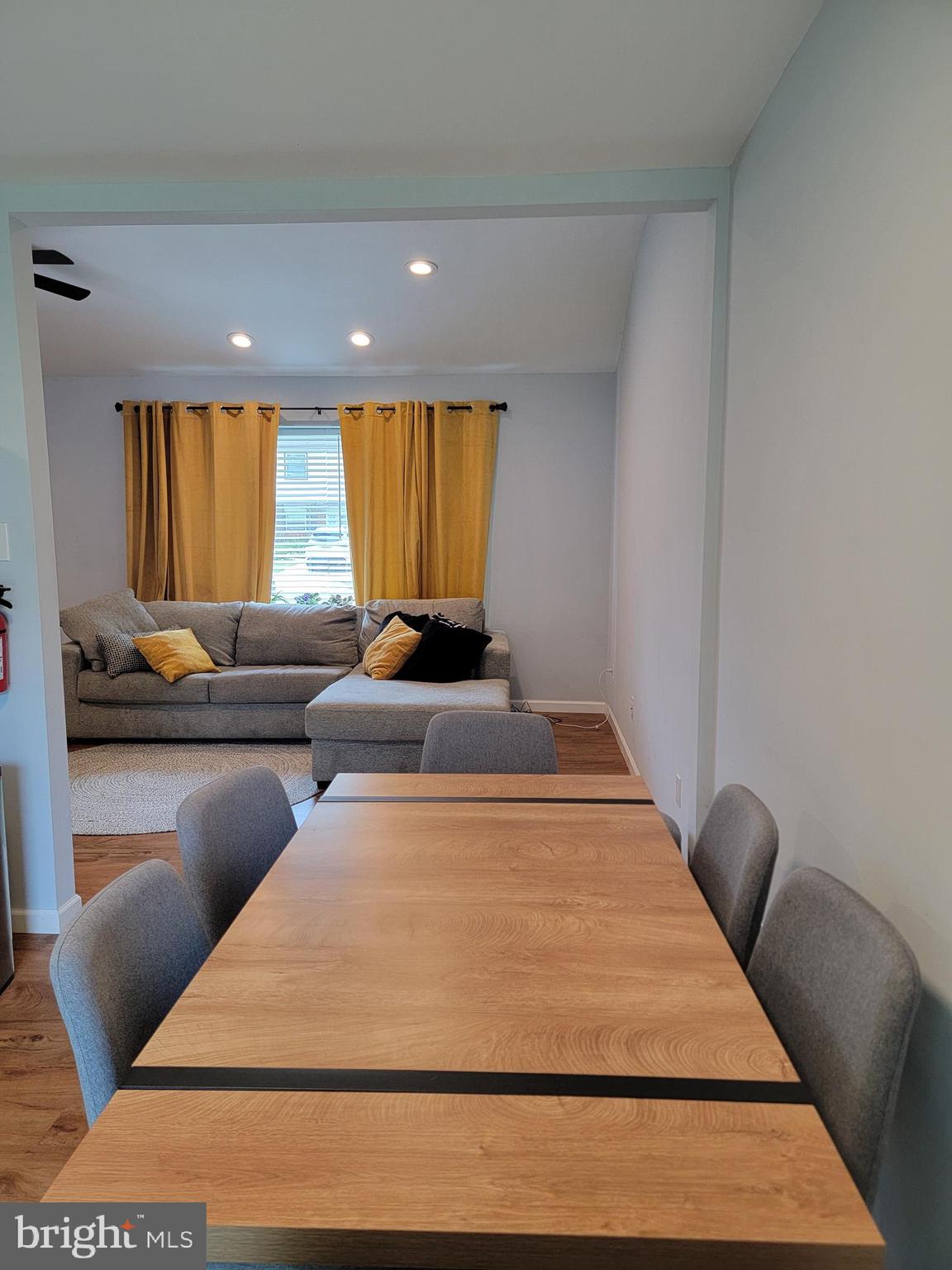 321 Independence Boulevard Lawnside, NJ 08045 - Photo 11 of 36 Dining area facing living area.