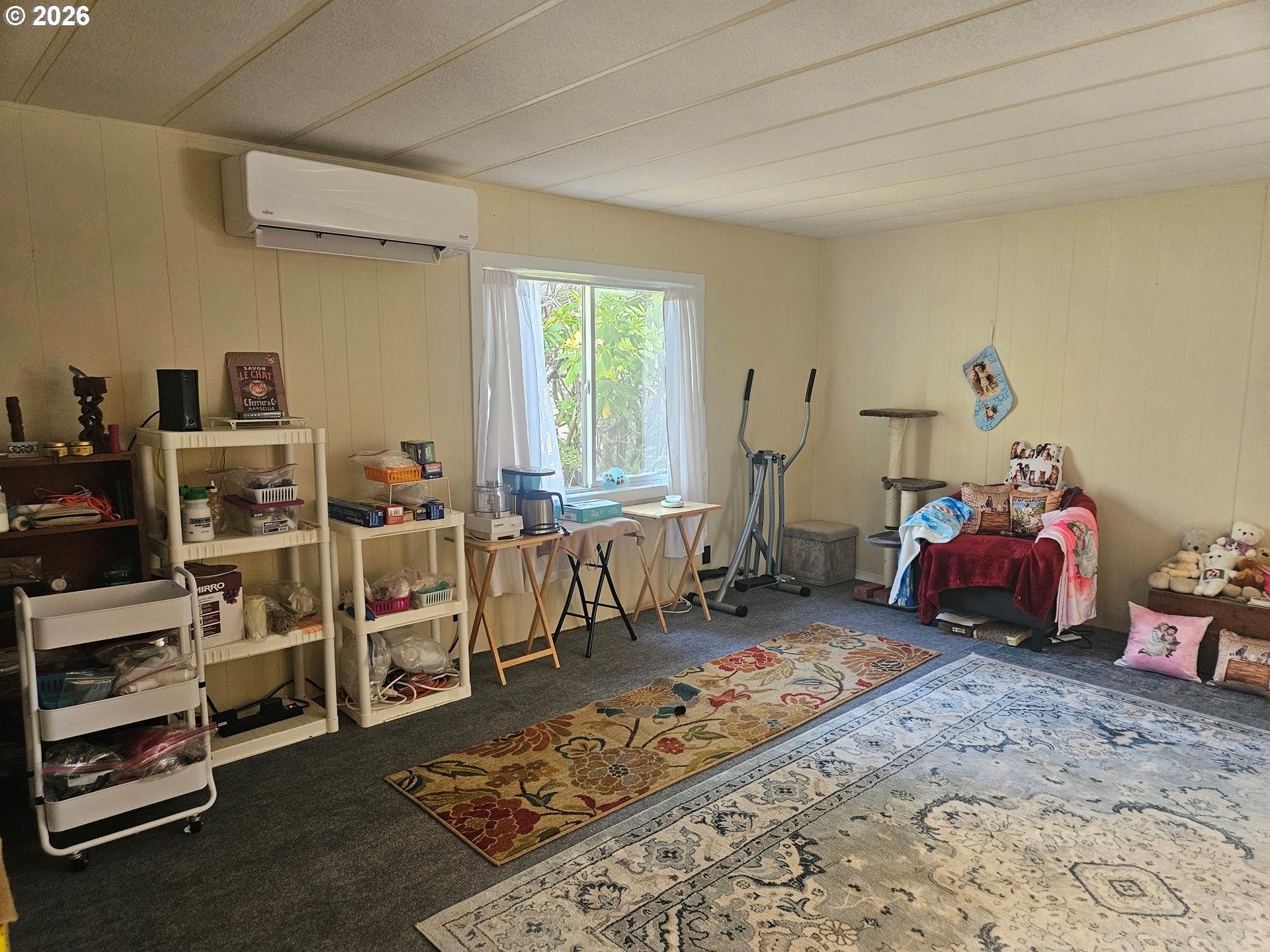 1600 Rhododendron Drive, Unit 214 Florence, OR 97439 - Photo 2 of 38 a bed room with furniture and a window
