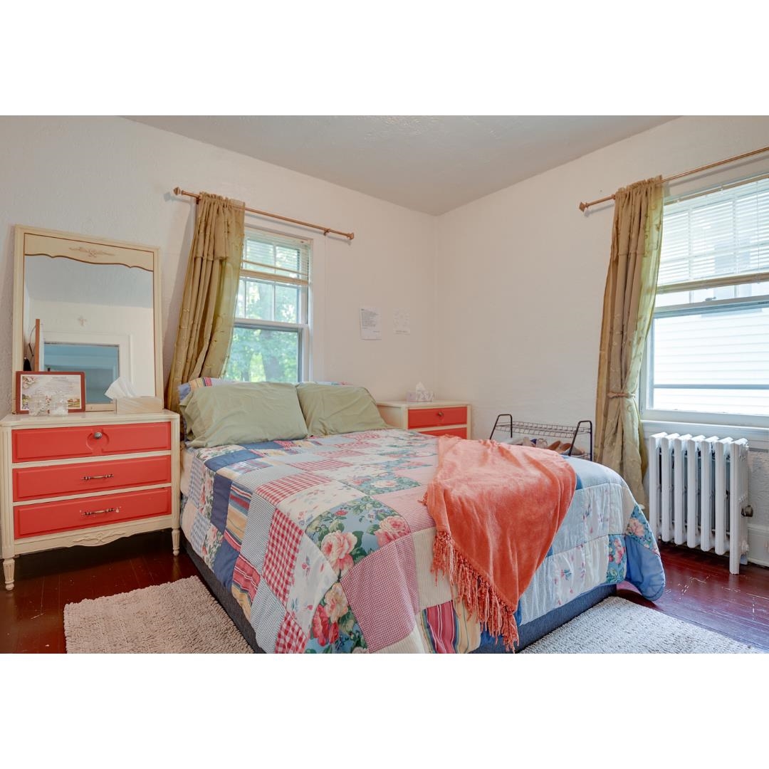 45 Ridgehurst Road West Orange, NJ 07052 - Photo 6 of 10 a bedroom with a bed and window