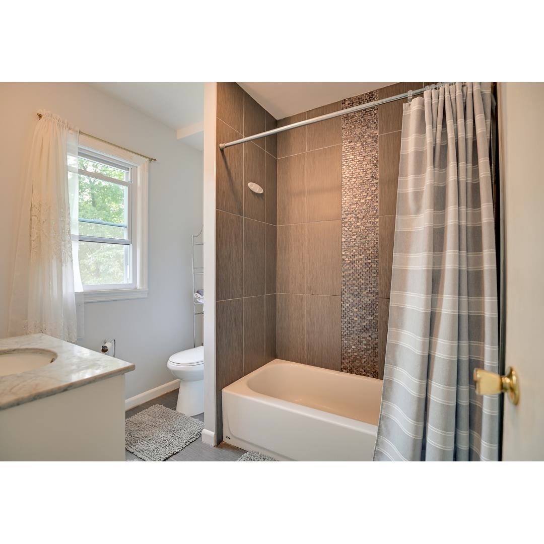 45 Ridgehurst Road West Orange, NJ 07052 - Photo 9 of 10 a bathroom with a sink toilet and shower