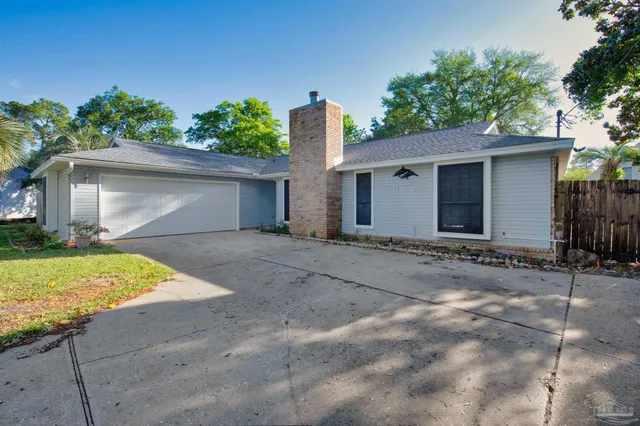 a front view of house with yard