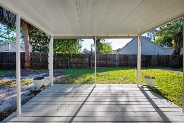 a view of backyard with green space