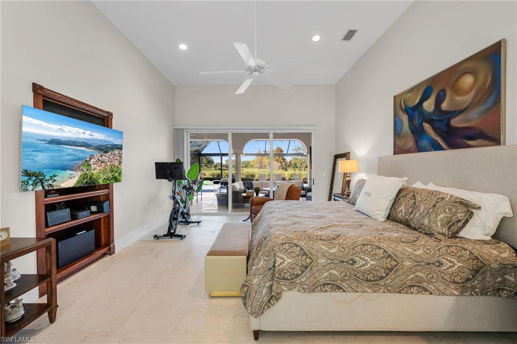 2041 Prince Drive Naples, FL 34110 - Photo 15 of 31 a living room with furniture and a flat screen tv