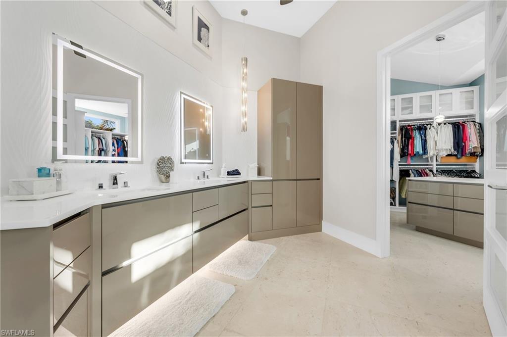 2041 Prince Drive Naples, FL 34110 - Photo 18 of 31 a kitchen with stainless steel appliances a refrigerator and a sink