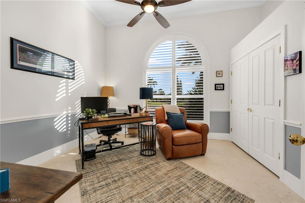 2041 Prince Drive Naples, FL 34110 - Photo 9 of 31 a view of a livingroom with workspace and a couch