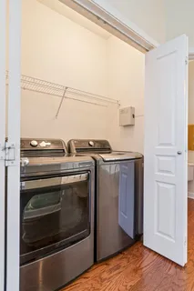 a kitchen with a stove and a microwave