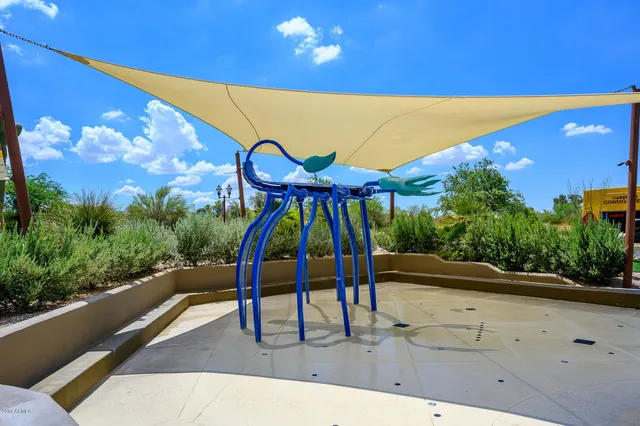 a backyard of a house with yard and outdoor seating