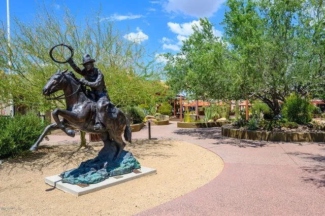 a childrens park with lots of swings and slides