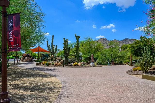 a view of a city with mountains in the background