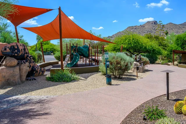 a view of a city with mountains in the background