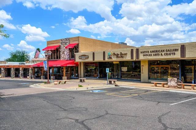 a view of a town with mountains in the background
