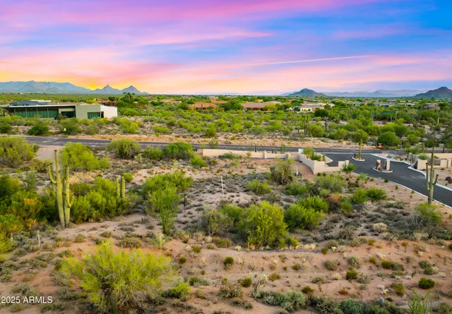 a view of a city with mountains in the background
