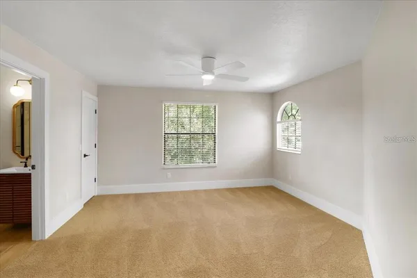 an empty room with windows