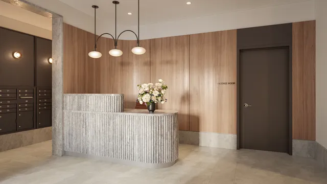 a lobby with furniture and floor to ceiling window