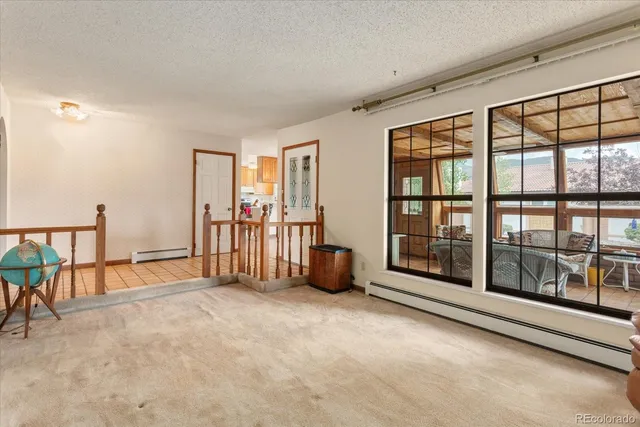 an empty room with windows