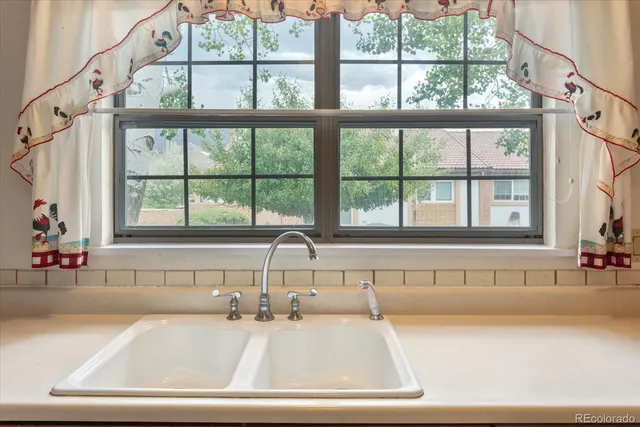 a bath tub sitting next to a window