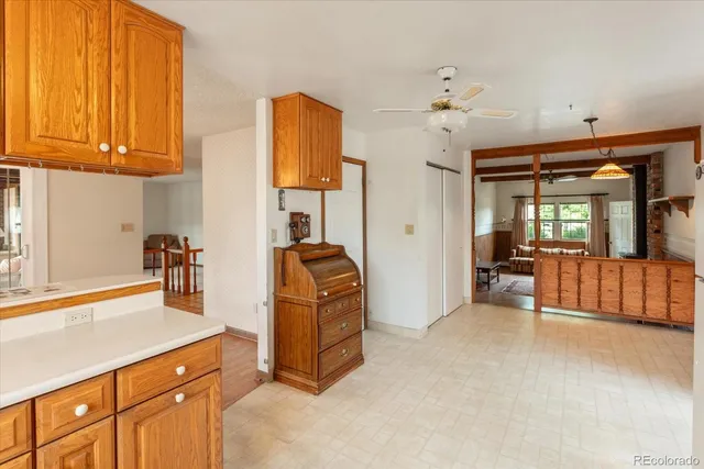 a room with furniture and a dresser