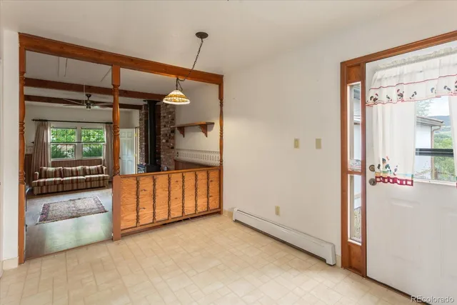 a view of an empty room and window