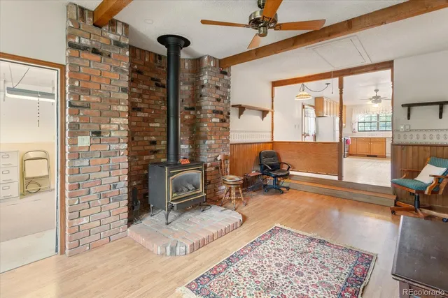 a room with patio rug and a rug