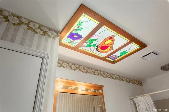 a view of a refrigerator and window