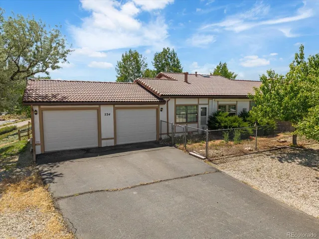a house view with a garden space