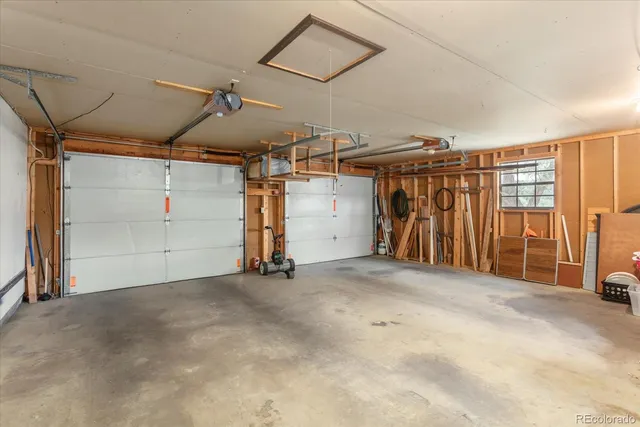 a view of a garage with gym equipment