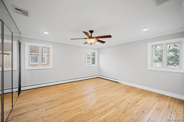 a bathroom with a sink mirror toilet and shower