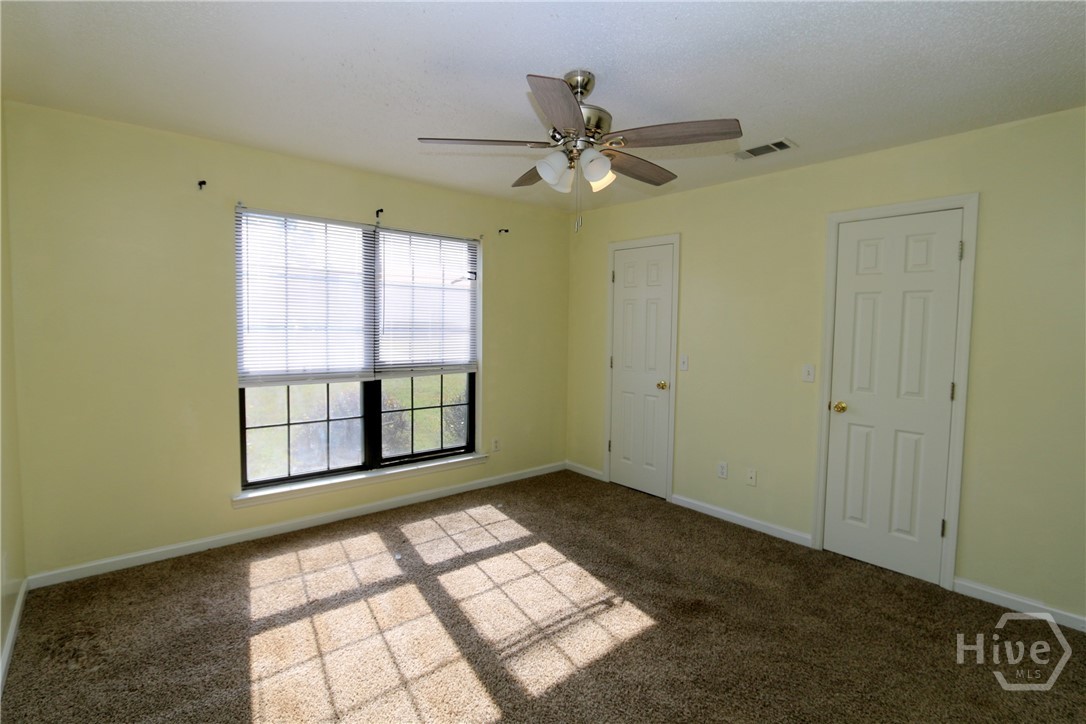 2352 Rowe Street Hinesville, GA 31313 - Photo 14 of 25 Primary suite