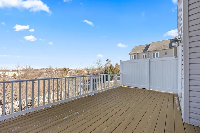 a kitchen with stainless steel appliances granite countertop a sink and a cabinets