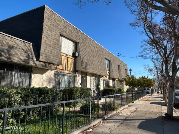 a street view along with residential houses