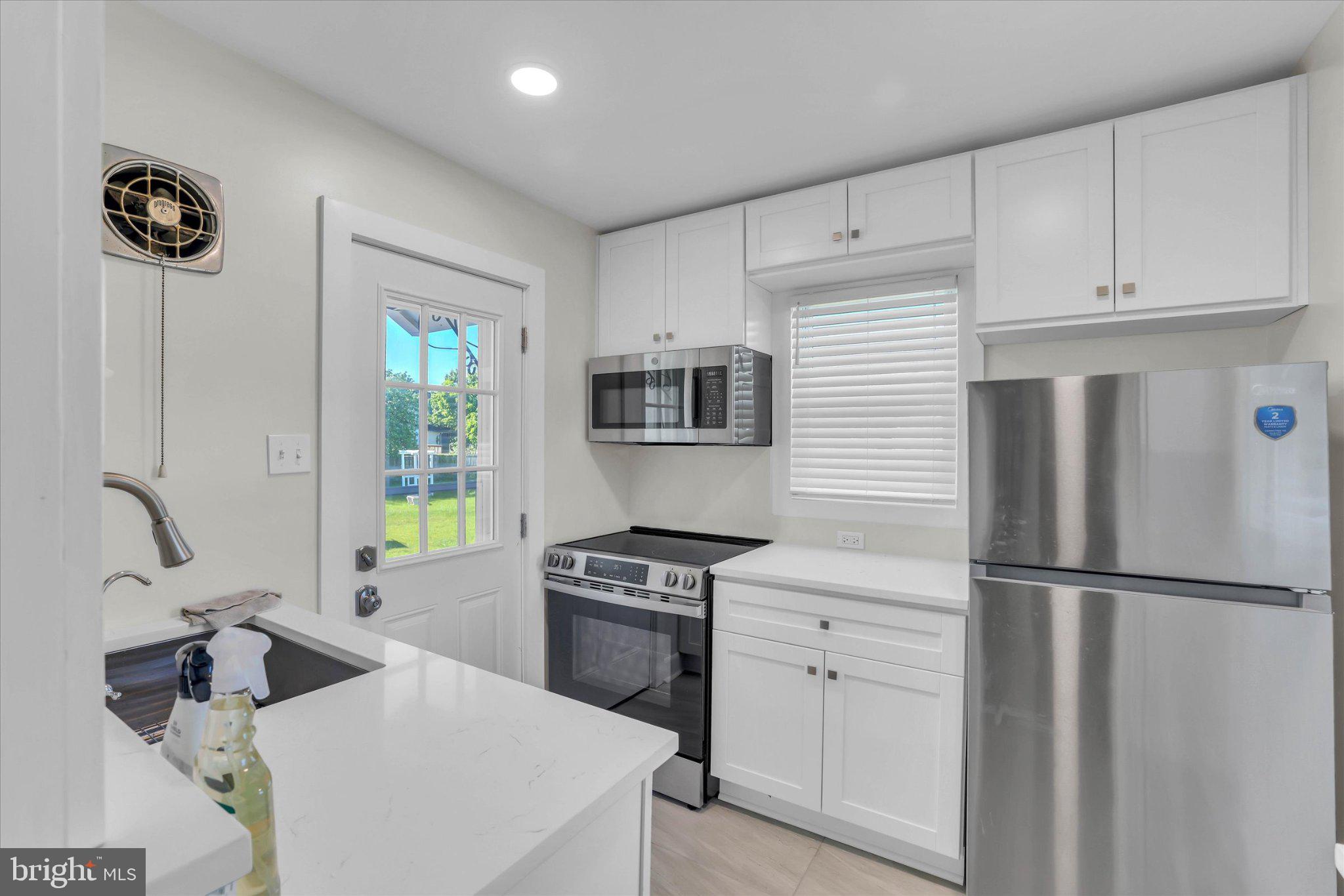 222 Berlin Road North Lindenwold, NJ 08021 - Photo 33 of 42 Modern kitchen with sleek finishes.