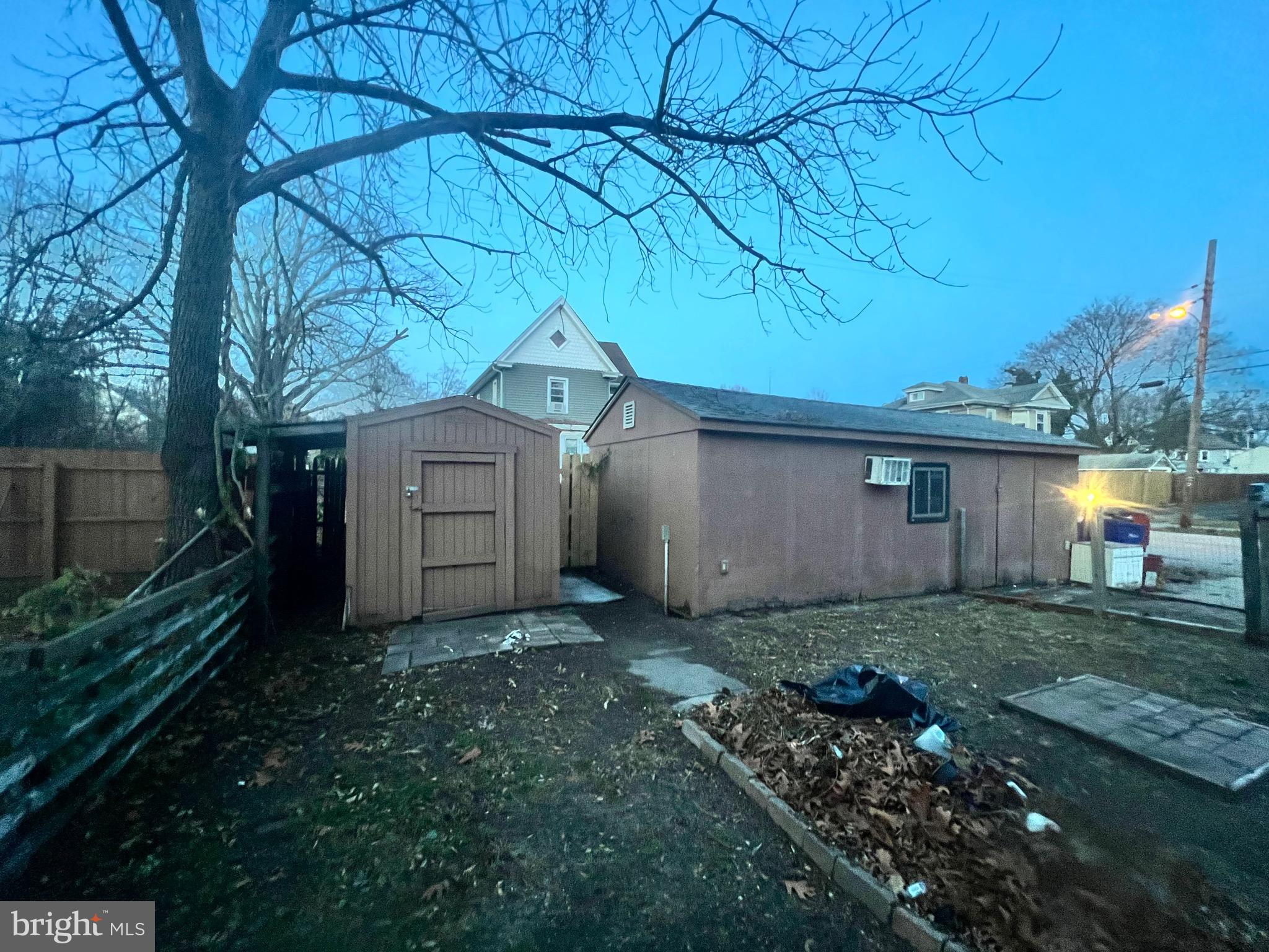 302 West Main Street Millville, NJ 08332 - Photo 12 of 22 a backyard of a house with lots of green space