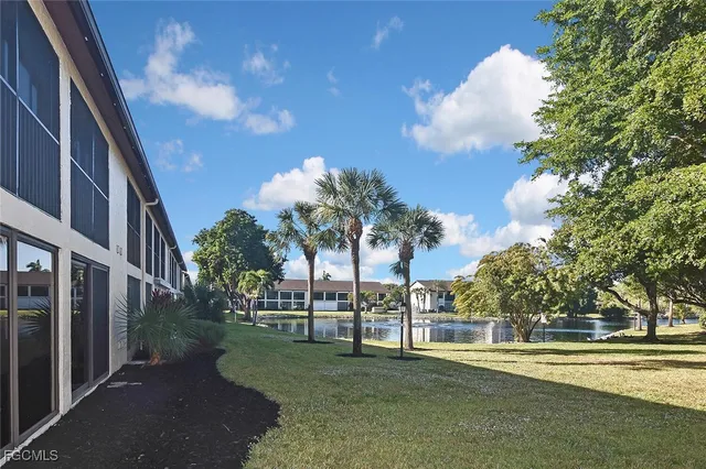 a view of a lake with a house