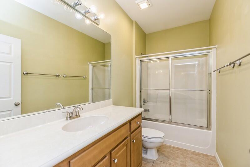 4599 Live Oak Church Road Crestview, FL 32539 - Photo 16 of 34 a bathroom with a sink a toilet and shower