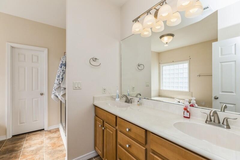 4599 Live Oak Church Road Crestview, FL 32539 - Photo 23 of 34 a bathroom with a double vanity sink mirror and double