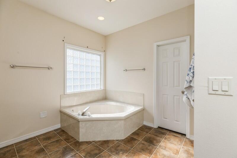4599 Live Oak Church Road Crestview, FL 32539 - Photo 24 of 34 a white bath tub sitting in a bathroom