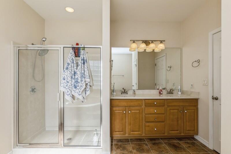 4599 Live Oak Church Road Crestview, FL 32539 - Photo 25 of 34 a bathroom with a granite countertop sink mirror and shower