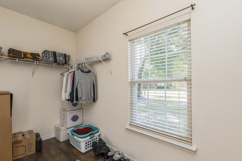 4599 Live Oak Church Road Crestview, FL 32539 - Photo 27 of 34 a view of walk in closet with clothes and shoes
