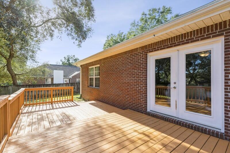 4599 Live Oak Church Road Crestview, FL 32539 - Photo 29 of 34 a view of backyard with a deck and a garden
