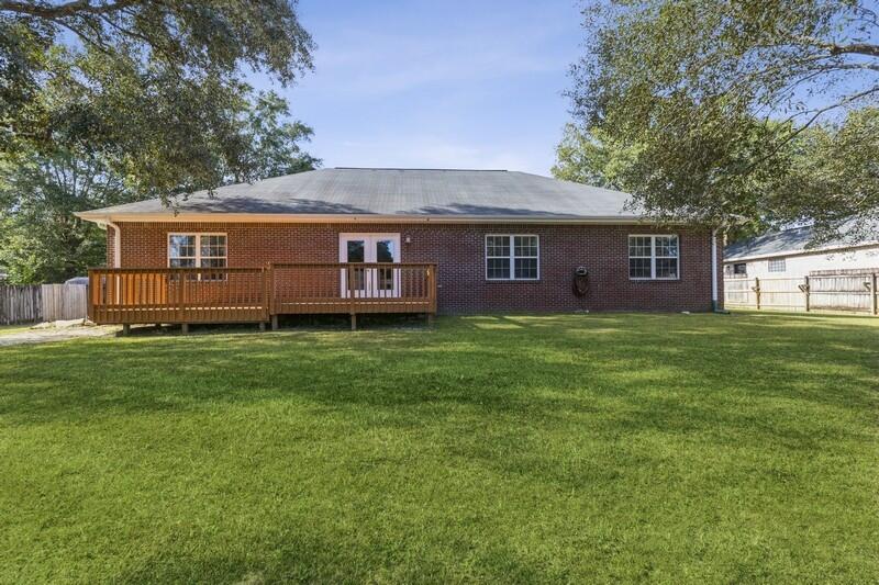 4599 Live Oak Church Road Crestview, FL 32539 - Photo 32 of 34 a front view of house with yard and green space