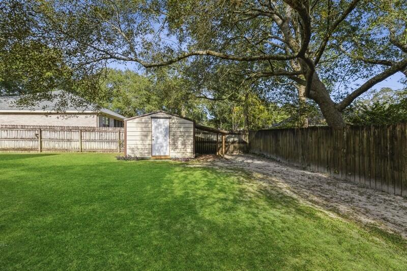 4599 Live Oak Church Road Crestview, FL 32539 - Photo 33 of 34 a backyard of a house with lots of green space