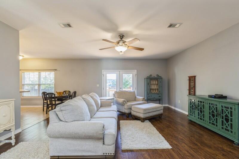 4599 Live Oak Church Road Crestview, FL 32539 - Photo 4 of 34 a living room with furniture a table and a large window
