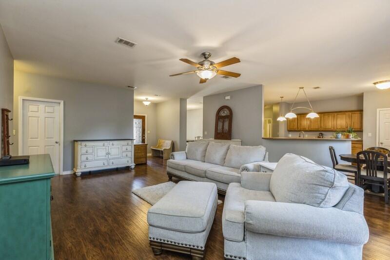 4599 Live Oak Church Road Crestview, FL 32539 - Photo 6 of 34 a living room with furniture and a large window