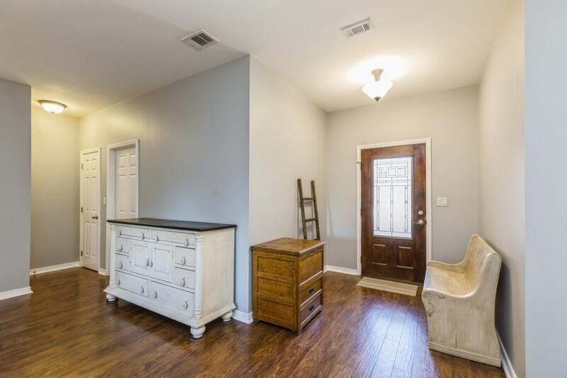 4599 Live Oak Church Road Crestview, FL 32539 - Photo 7 of 34 a view of a hardwood floor and wardrobe