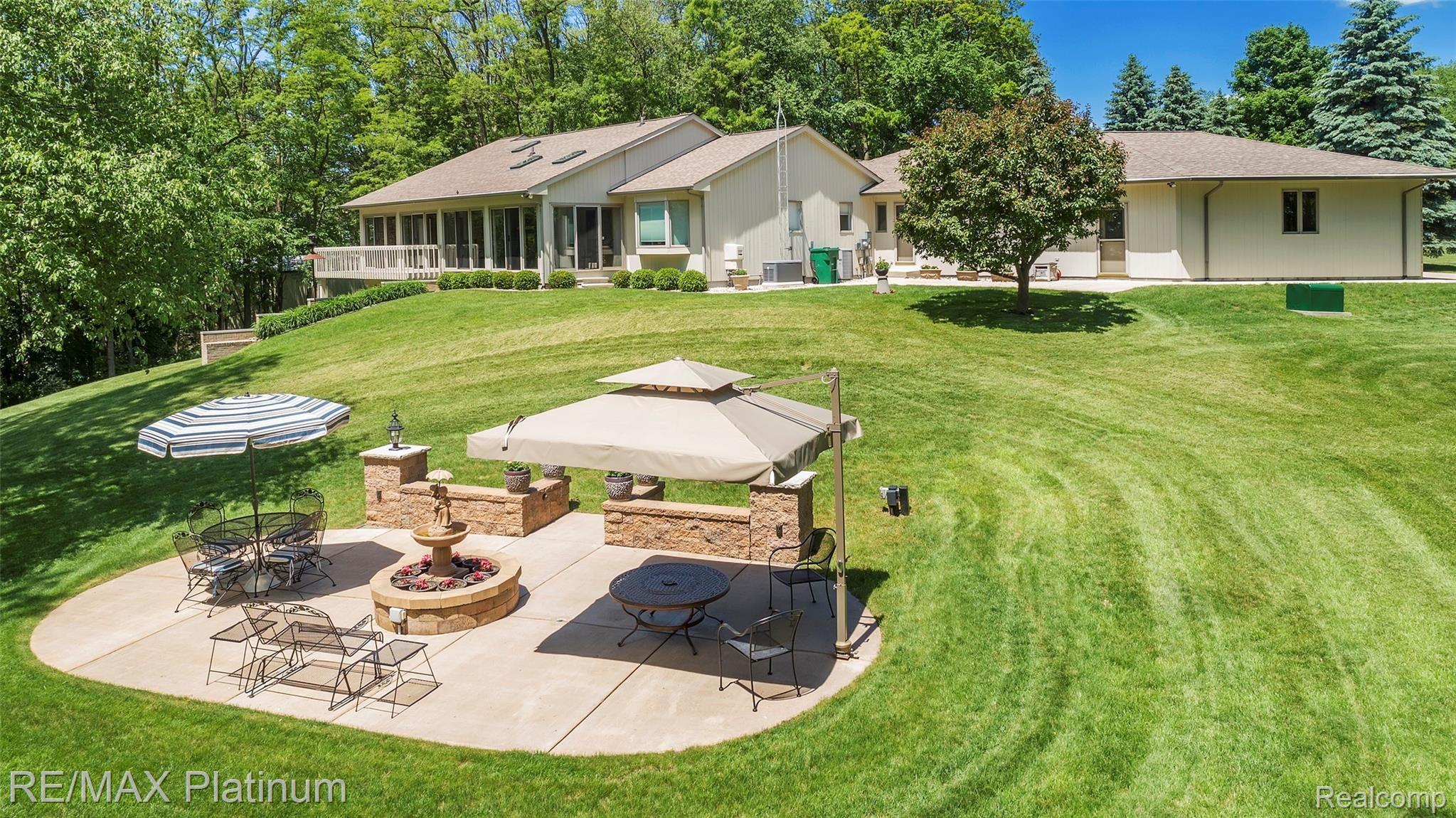 1848 Fox Ridge Drive Howell, MI 48843 - Photo 43 of 68 Gather around the fountain - perfect for a picnic