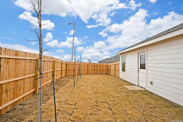 a view of a house with a roof