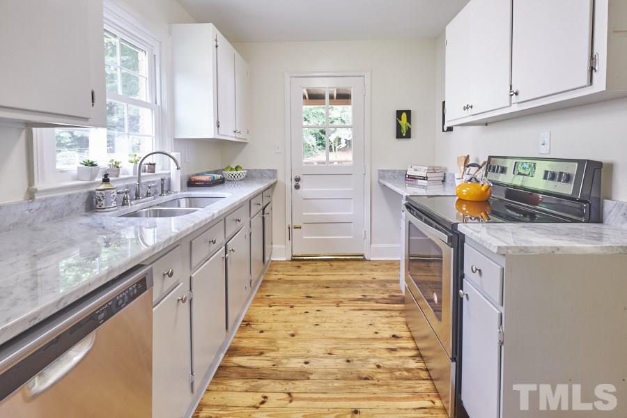 1829 Forest Road Durham, NC 27705 - Photo 14 of 25 Kitchen opens out onto back deck