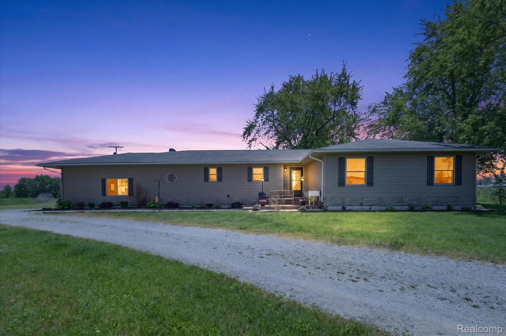 3949 West Burns Line Road Brown City, MI 48416 - Photo 1 of 70 Ranch-style residence featuring horizontal siding, a gravel driveway, and a covered porch entry