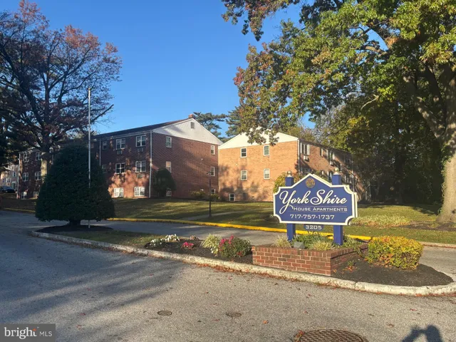 a sign that is on the side of a road